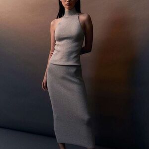 NWT! H&M knitted shimmering midi skirt. Silver metallic. Glittery. Medium.